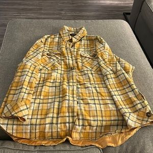 Davi and Dani. Black and Gold, flannel button up, tie waste. Size 1xl